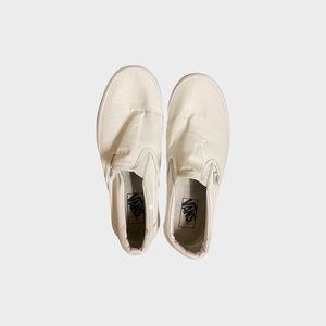 white slip on vans